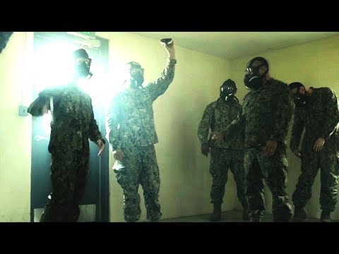 CHEMICAL, BIOLOGICAL, and RADIOLOGICAL defense TRAINING conducted by Navy Cargo Handling Battalion!