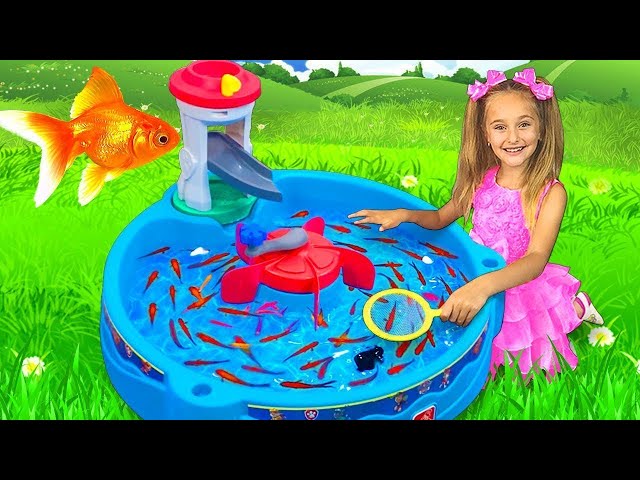 Vídeo relacionado con Uanqfegy Juguete Educativo para Acuario de bebé con luz y música, Juego de Pesca magnético con 4 Peces, 2 cañas y Red para niños