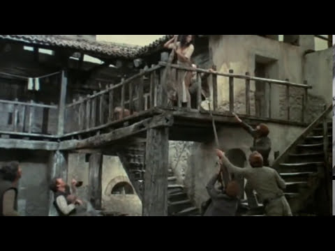 Trailer frame evoking Don Quixote riding into battle in Man of La Mancha