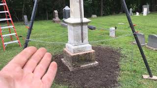 Tripod chain hoist used in cemetery restoration