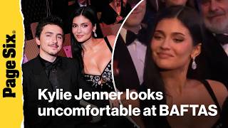 Kylie Jenner looks uncomfortable during Alan Cummings joke at BAFTAS