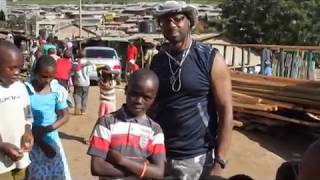 preview picture of video 'My Bodyguard in the Kibera Slums, Nairobi, Kenya - Cedric Singleton'