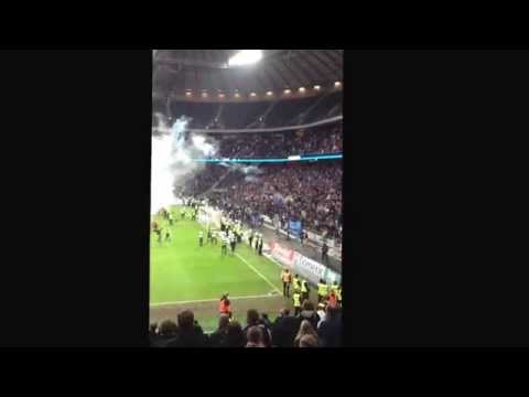 IFK hooligan throwing a bengal on DIF supporters!!