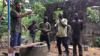 Bamore - opening a hand dug well in Liberia
