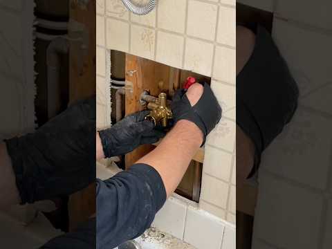 Shower Valve Swap: Soldering in a New One on Linoleum Walls! 🚿🔥 #plumber #plumbingtips #soldering