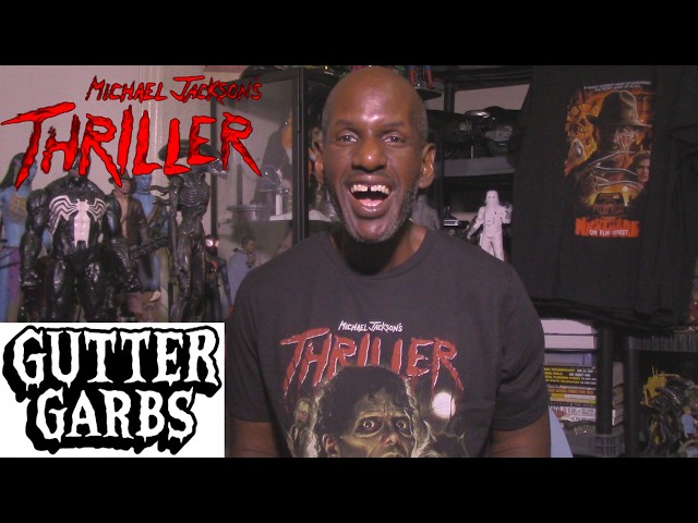 Vídeo relacionado con CRAZY FOR ROCK Michael Jackson Camiseta Oficial Thriller. Camiseta Unisex de Algodón. Camiseta de Ajuste Regular para Adulto y Niño, Negro , XS