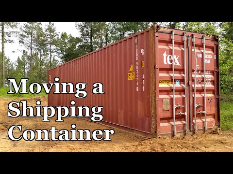 Part of a video titled Moving a Shipping Container with a Skid Steer - YouTube