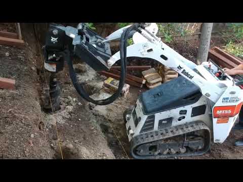Bobcat MT55 Auger attachment in action