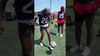REDBLACKS players try soccer skills