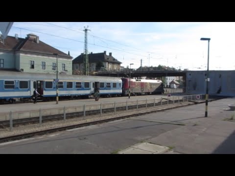 Hungary: Gyor station scene featuring GySEV Class 470 'Taurus' electric loco in 'Wagner' livery
