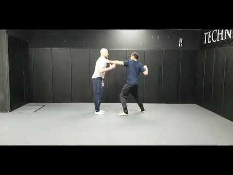 Lapel grab, punch to face  Elbow block