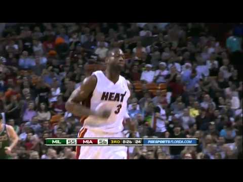 Dwyane Wade tip dunk over Ersan Ilyasova vs. Bucks 1.4.11 (HD)