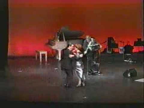  Roxana Belmonte  and  Fabian Belmonte  are  dancing  to  the  tango  "  A la Guardia Nueva  "