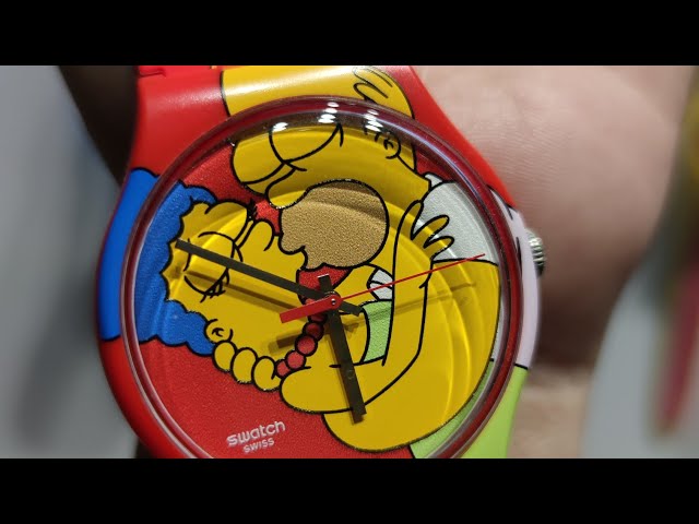 Vídeo relacionado con Swatch Reloj The Simpsons Gent SO28Z126 Tidings of Joy, Pulsera, Clásico, Clásico
