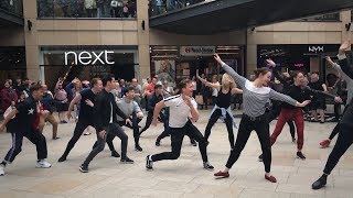 Shoppers get an all-singing all dancing surprise... and it's Too Darn Hot!