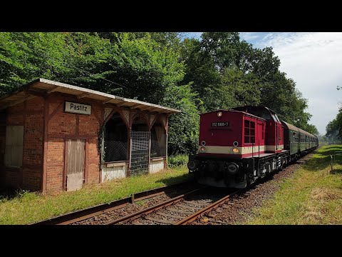 112 565-7 und Slz 86 1744-1 mit PRE 74873 zw. Putbus und Bergen auf Rügen am ehem. Bahnhof Pastitz