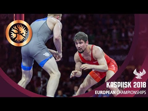 BRONZE FS - 65 kg: V. KHINCHEGASHV (GEO) v. K. BIENKOWSKI (POL)