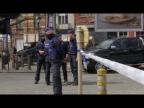 Belgium - Police operation in Brussels / Scenes in Molenbeek after overnight raids / Thousands march