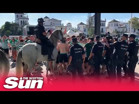 Celtic fans moved by police near Real Betis stadium in Seville before Europa League game