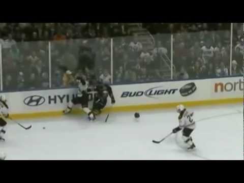 Joe Corvo hipchecks Corey Tropp