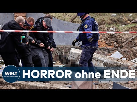VIELE MASSENGRÄBER: Immer mehr Toter werden bei Kiew gefunden - Menschen unter Schock