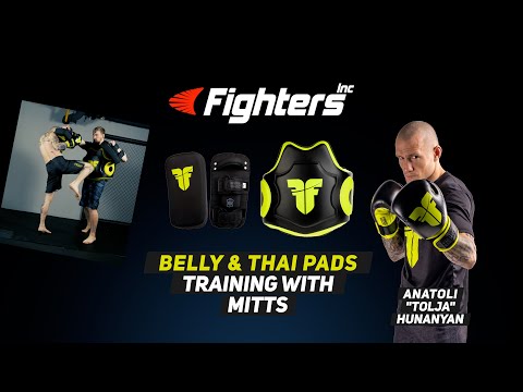 Training on Thai Pads and Belly Pad