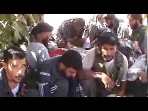 استراحة مقاتلي كتائب حماة السنة أثناء رباطهم في منطقة كفرنبودة في ريف حماة