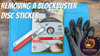 Removing a Blockbuster sticker from an OG Xbox game!
