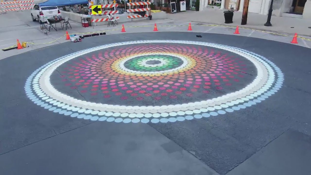 Artist’s mural takes over downtown Alton streets