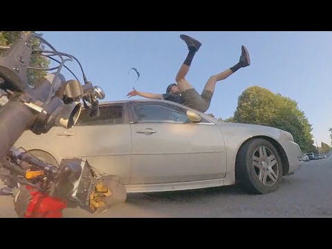 Cyclist Lands on His Feet After Being Hit by Car