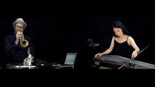 Piece for Trumpet, Guzheng, Digital Delays, and Rice