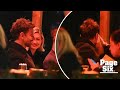 Gigi Hadid plants a kiss on Bradley Cooper during PDA-packed date night in NYC