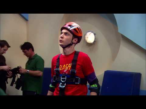 2x13 Sheldon climbs a rock