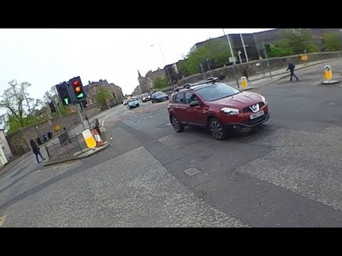 WHY DON'T CYCLISTS STOP AT RED LIGHTS?