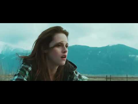 New Moon final trailer frame: Bella and Edward in the forest, somber autumn light
