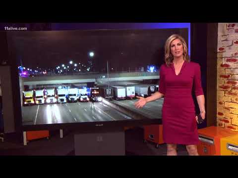 13 semi-trucks park on Interstate to protect man who wanted to jump off bridge