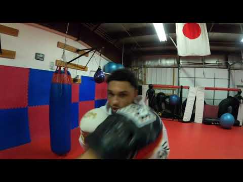 Coach Dylan holding mitts (GoPro cam)