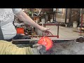 David Smith of Blowing Sands Glass making hearts