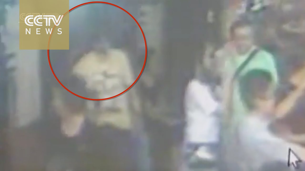 Suspect of deadly Bangkok blast attack spotted by on security camera - YouTube