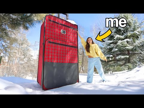 Surviving Using World's LARGEST Suitcase in the Snow
