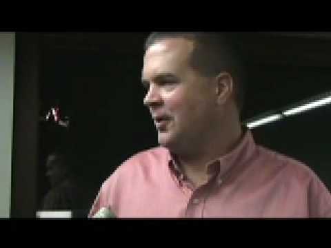 Georgia offensive line coach Stacy Searels speaks with the media