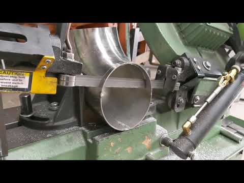 Harbor Freight Green Bandsaw cutting 5" Titanium Elbow