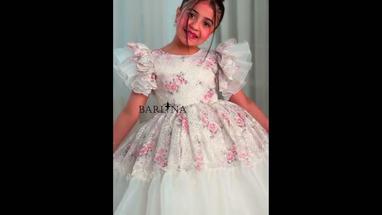 Off-white girls' dress with ruffled sleeves - 2 years