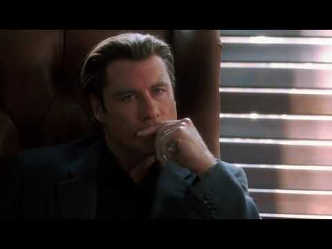The Punisher (2004) official trailer frame with Frank Castle brooding beside a muscle car