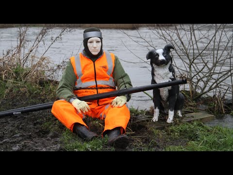 Angling Trust Cormorant Scaring Mannequin Hampshire Avon mannequin-man performming as a Living Mannequin: mannequin redressed in a new set of orange hi-vis clothing, ready to scare off the cormorants again for Angling Trust on 24/01/2020