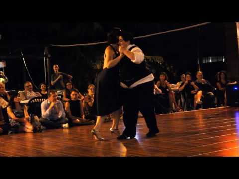  Corina de la Rosa  and  Aoniken Quiroga  are  dancing  to  "  Que Tiempo Aquel  ",    "  Rie Payaso  ",    or  "  Pobre Flor  "  by  Francisco Lomuto,    Alfredo De Angelis,    or  Juan D'Arienzo