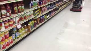 Titan Twin cleaning sticky dirty spill - Grocery store