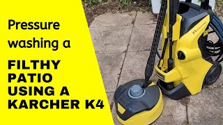 Pressure washing a filthy patio using a Karcher K4 pressure washer
