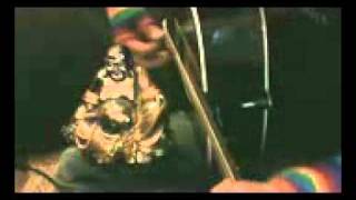 KRISNA RAVE SONG, WITH BUDDHA ON THE KNEE  WITH SPIRAL M'S HANDS WITH GLOVES ON._mpeg4.mp4