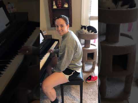 Cori Serenades her Cats